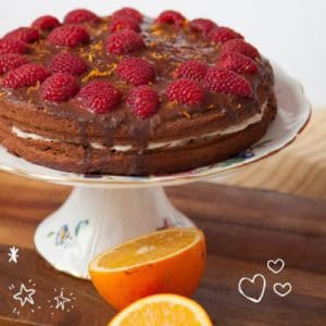 Healthy Orange Chocolate Cake with Chocolate Ganache & Raspberries