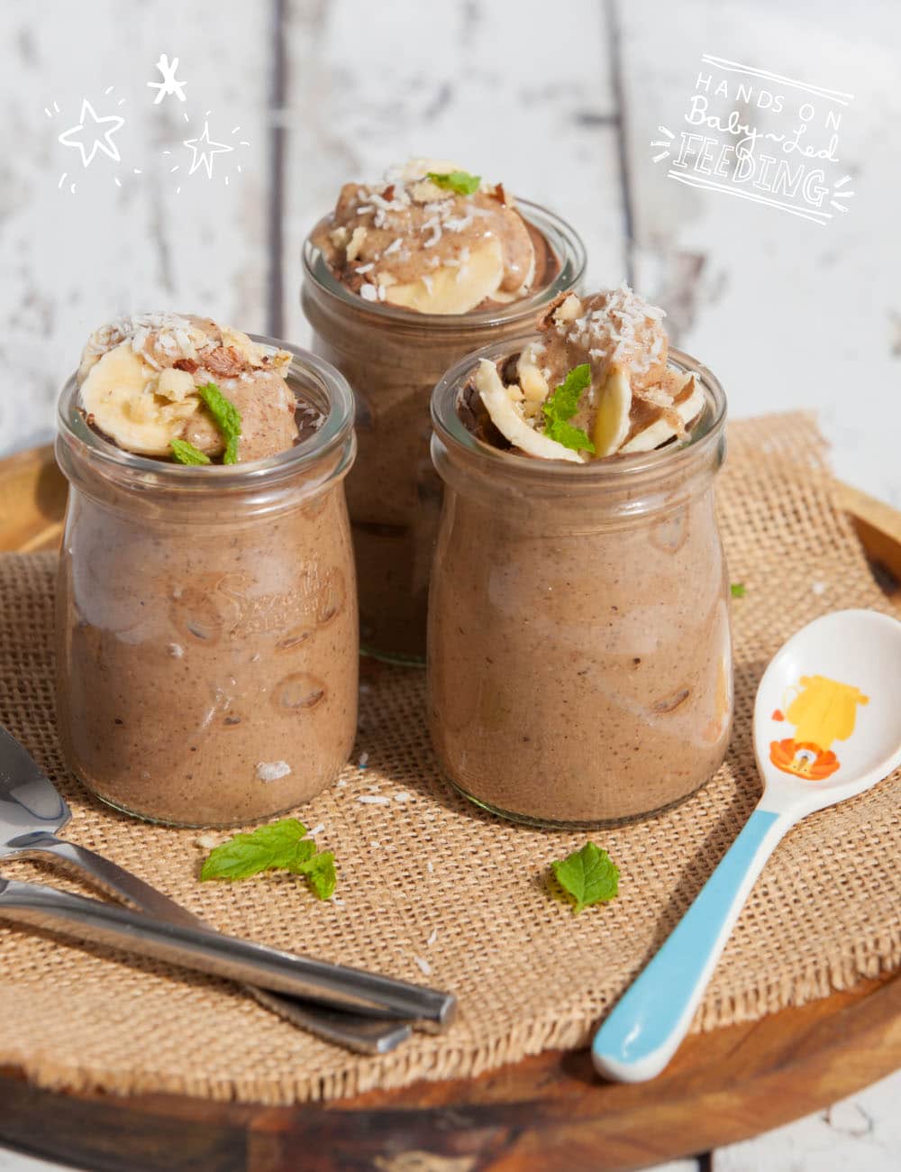 Healthy Chocolate Chia Pudding using only the best ingredients especially from Baby Led Feeding. Long image showing chocolate chia pudding topped with bananas, coconut and peanut butter. Healthy treats for toddlers. This really delicious recipe for Baby Led Weaning is a yummy treat for kids and really healthy too. Baby Led Weaning natural treat recipe. BLW natural treats.
