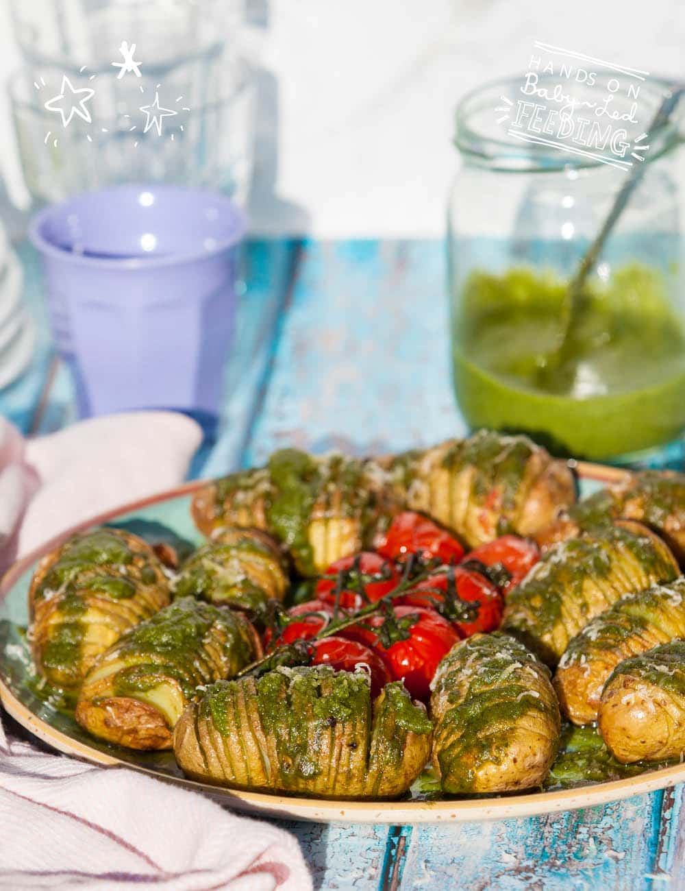 Hasselback Baby Potatoes with Basil and Spinach Pumpkin Seed Pesto easy, quick and amazingly nutritious Zoomed in front image. A sure winner for fussy kids. One family one dinner recipe. Homemade Baby Food Recipes for baby led weaning by Aileen Cox Blundell author of The Baby Led Feeding Cookbook.
