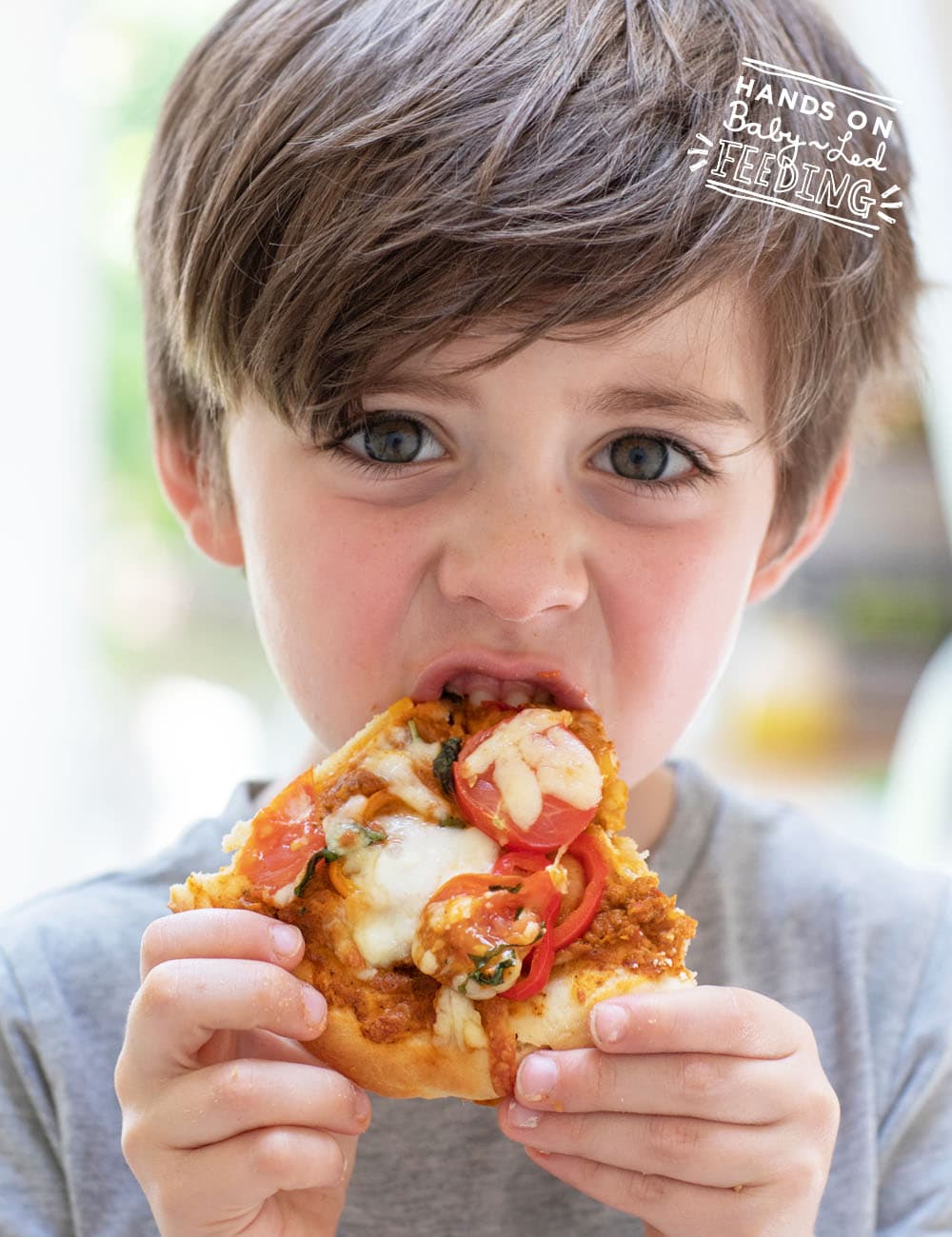 Juicy tomatoes and fresh sweet peppers give this healthy pizza a lightly sweet bite making it great for younger palates. Picky eater vegetable pizza is a family friendly nutritious recipe that only takes 10 minutes! #babyledweaning #pickyeater #toddlerfood #pizza #familyfood #refinedsugarfree 
