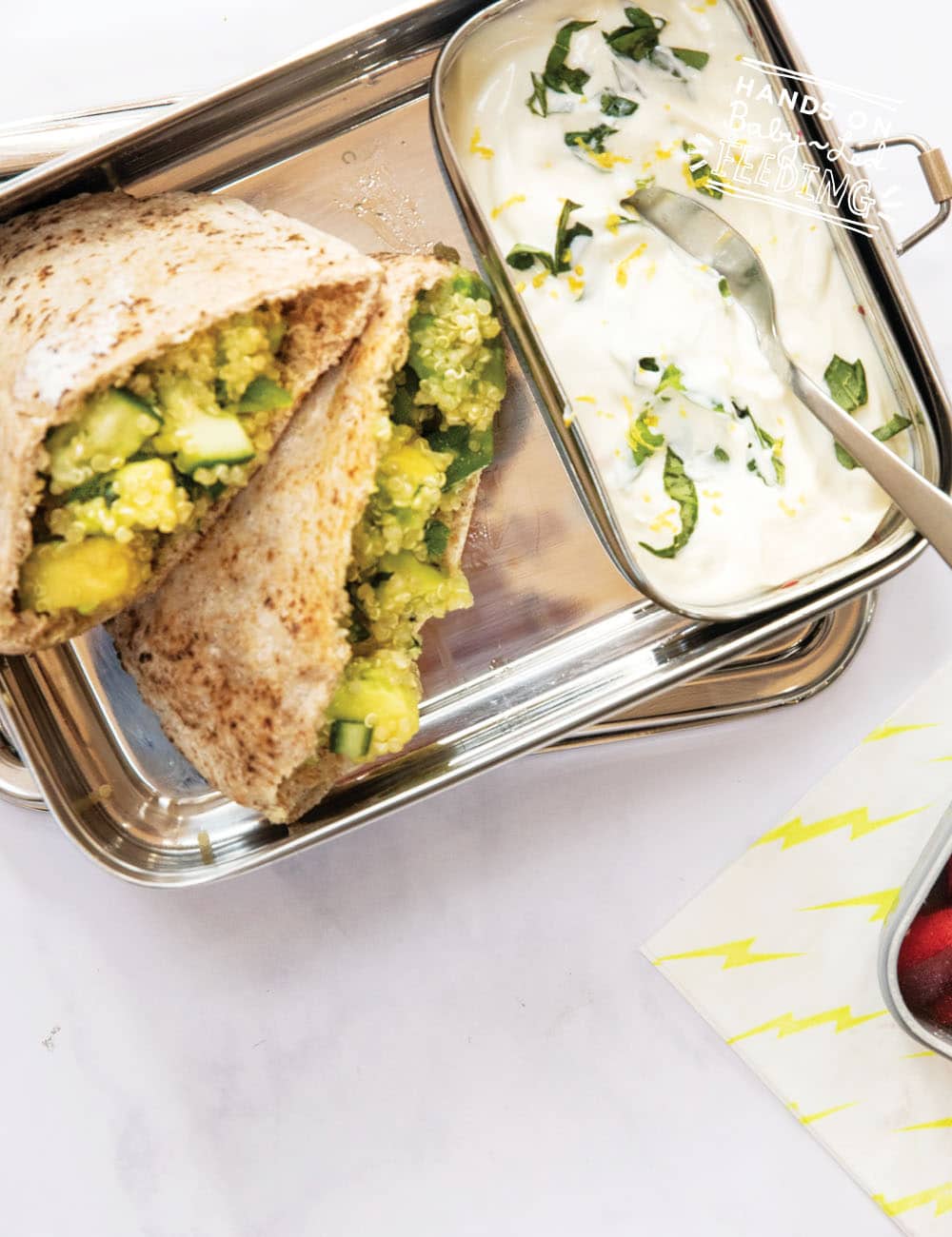 Pitta pockets with quinoa salad and yogurt dip. This is an easy and healthy toddler meal that is full of vegetables. Avocado, cucumber, lemon, and mint flavor this yummy lunch or dinner recipe!