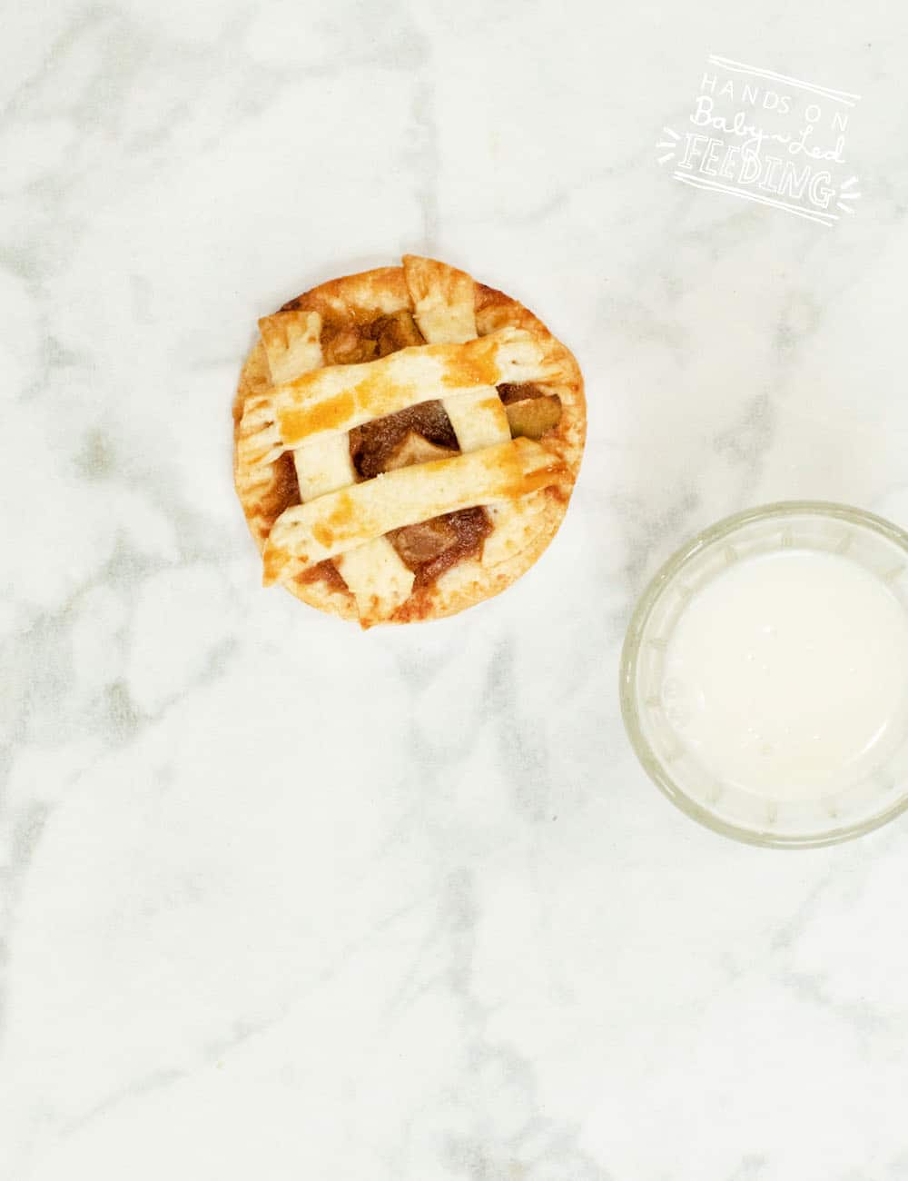 Fresh apple pie COOKIES! Homemade sweet apple filling with a light and crispy crust.The perfect finger food for baby and toddler hands. Refined sugar free treat that is perfect for baby led weaning snack! #babyledweaning #cookies #applepie #refinedsugarfree