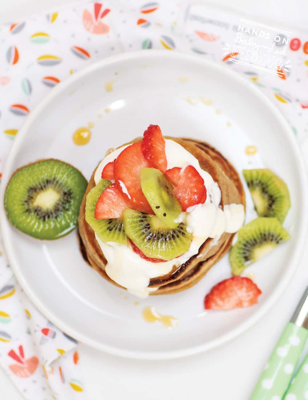 An easy & healthy idea for baby breakfast that can be made all in one blender! Made with nutritious oats and yummy strawberries, kiwi, and banana, this baby pancake is great for 6 mo+! Naturally sweetened with fruit, this healthy baby breakfast is refined sugar-free. 
