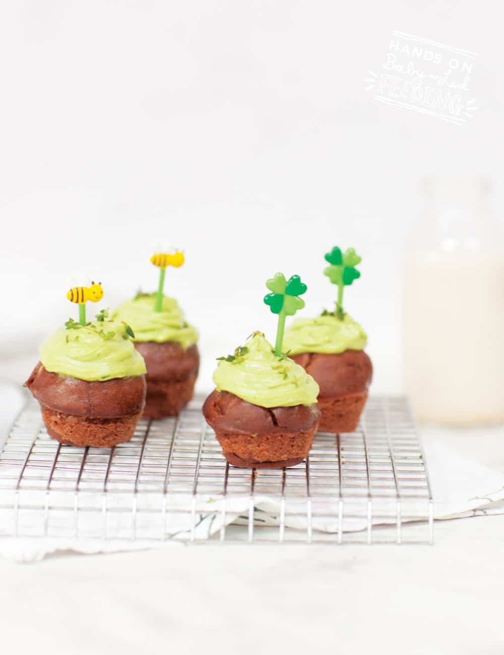 Healthy Brownie Bites for Baby Led Weaning. Refined sugar-free naturally sweetened with bananas! Vegan frosting naturally sweetened and colored! Healthy St. Patrick's Day recipe for kids! #irish #stpatricksday #browniebites #refinedsugarfree #bananas #babyledweaning #babyledfeeding #babyfood #fingerfood #partyfood #makeahead