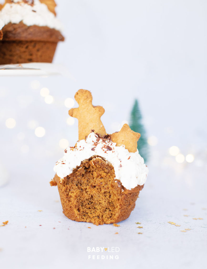 Baby led weaning muffins made using gingerbread spice and topped with healthy cream cheese frosting.