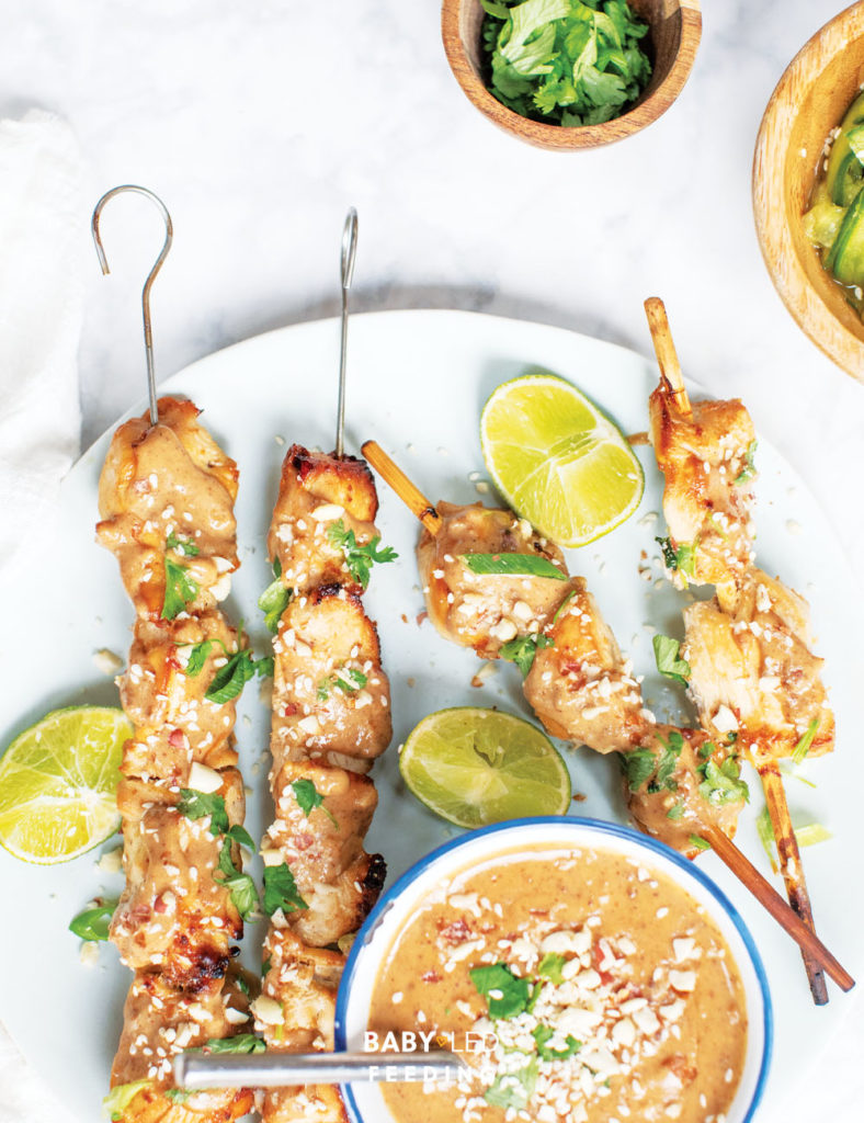 Chicken Satay with Sesame and Soy Close up with limes