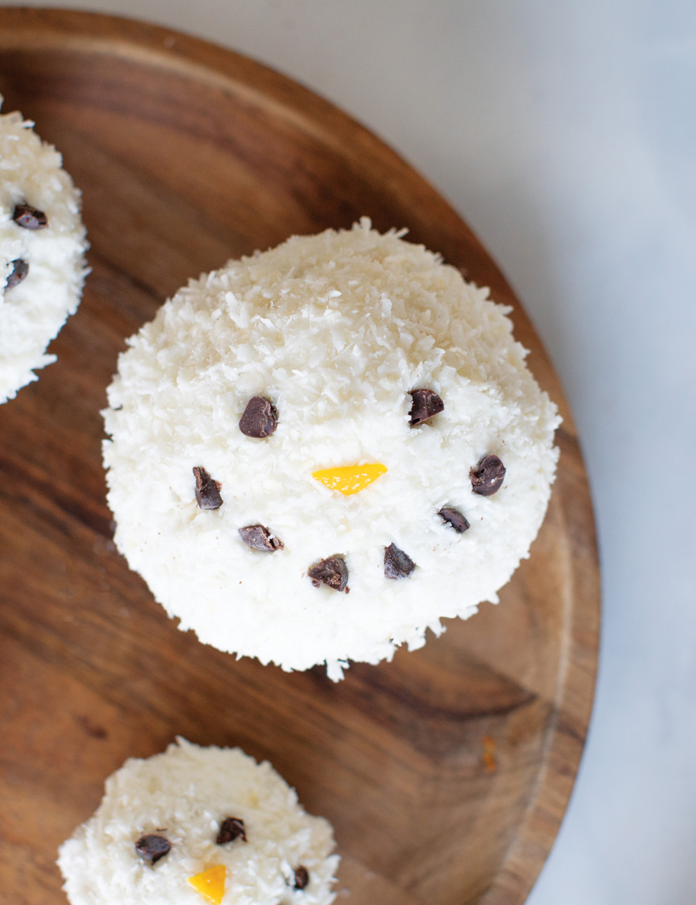 Coconut Frosting Snowman Muffins Recipe Image